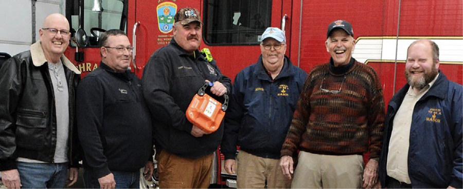 Photoed from left: Brother Gregory Dobbins, Fire Captain Meyer, Fire Chief Mac Donald, District Representative Mitch Custer, Village President Mike McCutchen, and Brother Andy Buecher. 